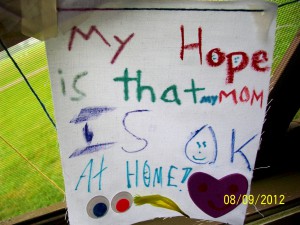 Camper's art project says, "My Hope is that MY MOM IS OK AT HOME!"